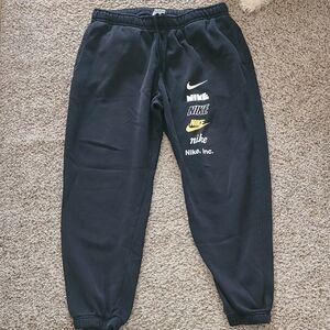 Nike Black Joggers with Multi Logo Design